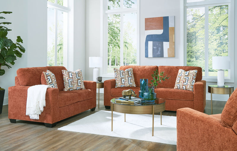 Signature Design by Ashley Aviemore living room set with stationary sofas and loveseat, featuring plush upholstery and modern design.