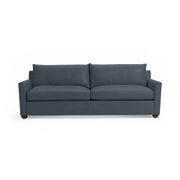 Classic Home Olivia stationary sofa with plush fabric upholstery, featuring a modern design and comfortable seating.