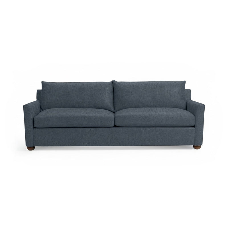 Classic Home Olivia stationary sofa with plush fabric upholstery, featuring a modern design and comfortable seating.