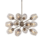 Uttermost Chet 12 Light Sputnik chandelier with light brown finish, featuring a modern geometric design and multiple spherical bulbs.