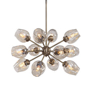 Uttermost Chet 12 Light Sputnik chandelier with light brown finish, featuring a modern geometric design and multiple spherical bulbs.