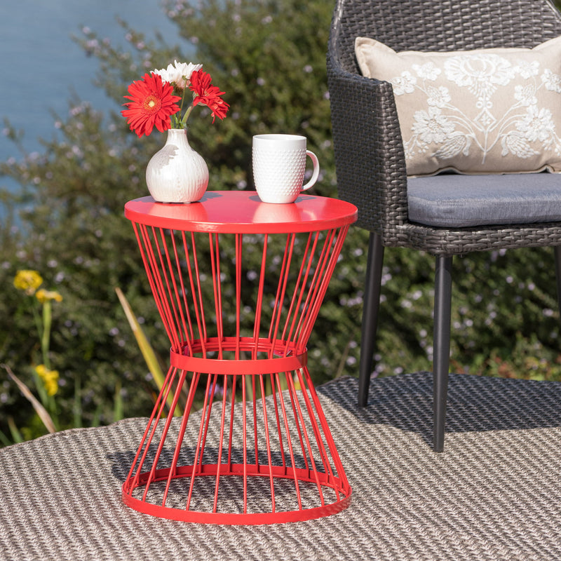 Modern outdoor side table by Noble House featuring an hourglass design, perfect for patio or garden decor.