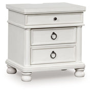 Rowlenstown - Three Drawer Night Stand - R&R Furniture Gallery (Fountain Valley, CA)