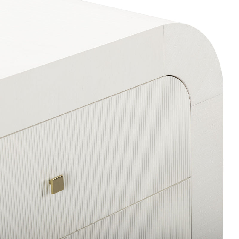 TOV Furniture Hump bedside chest with wood finish and modern design, featuring drawers for bedroom storage.