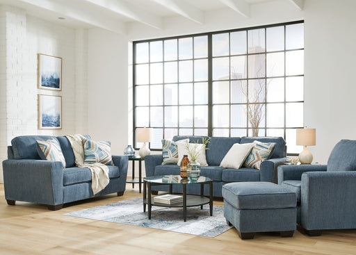 Signature Design by Ashley Cashton living room set with stationary chair and ottoman, featuring plush upholstery and modern style.