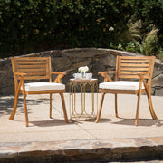 Noble House teak dining chair set with water-resistant cushion, wooden frame and comfortable seating for outdoor or indoor dining.