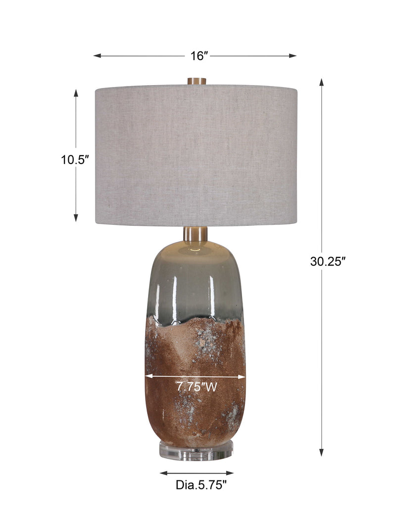 Uttermost Maggie ceramic table lamp in light brown with a smooth, rounded base and fabric shade, perfect for modern home decor.