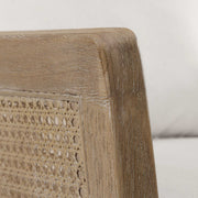 Uttermost Encore natural armchair with white upholstery and wooden legs, showcasing a modern, stylish design.
