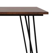 Simpli-Home Hunter handcrafted dining table with wooden surface and sturdy legs, ideal for family meals and gatherings.