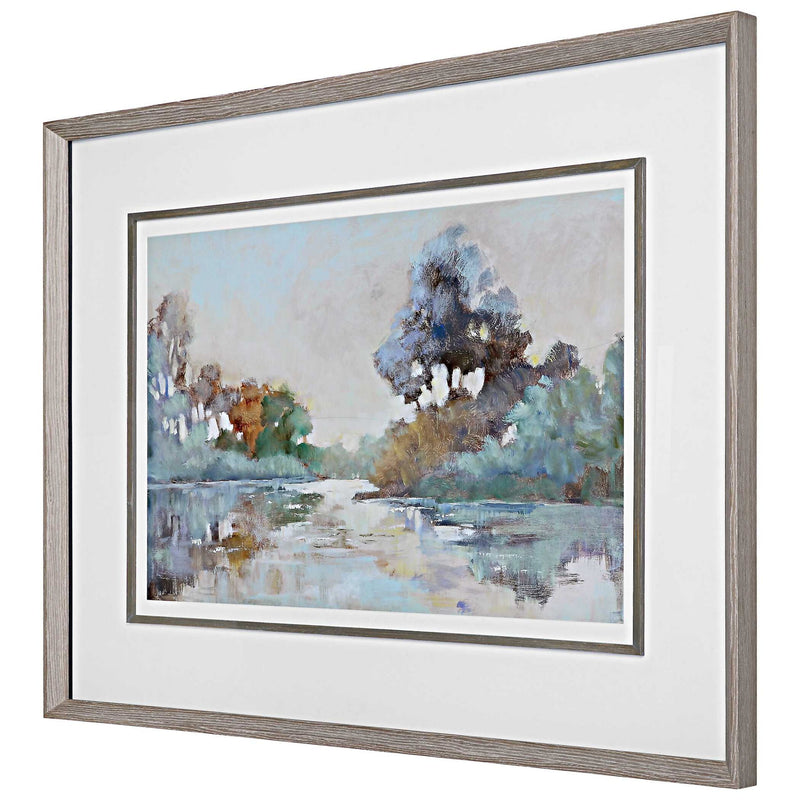 Watercolor framed print of a serene morning lake scene in blue by Uttermost, showcasing calming nature artwork for wall decor.
