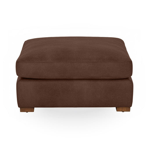 Classic Home Audrey upholstered ottoman with plush fabric and wooden legs, serving as a stylish footrest or accent piece.