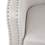 Noble House modern upholstered swivel club chair with nailhead trim, featuring a plush fabric and a 360-degree swivel base.