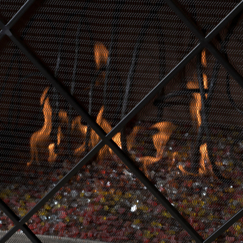 Noble House minimalist single panel iron fireplace screen with diamond design, showcasing a sleek, decorative fireplace safety barrier.