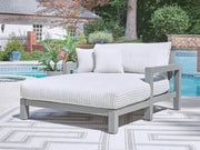 Gray Hurley Park chaise lounge with cushion by Signature Design by Ashley, featuring a sleek, modern outdoor seating design.