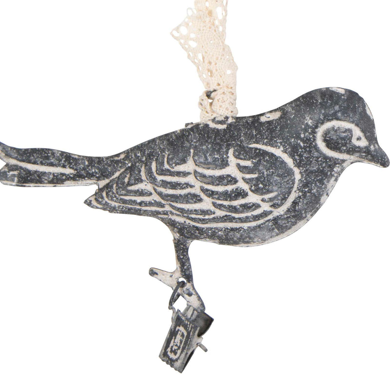 Light brown birds on a branch wall art by Uttermost, decorative wall decor featuring natural bird and branch design.