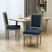 Noble House traditional style dining chair set with fabric upholstery, showcasing elegant wooden frames and cushioned seats.