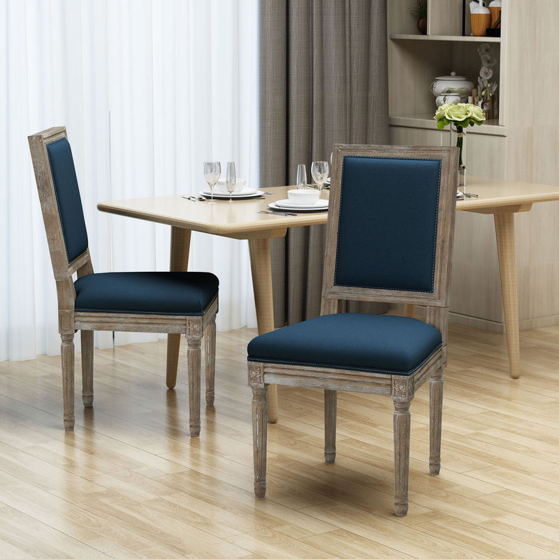 Noble House traditional style dining chair set with fabric upholstery, showcasing elegant wooden frames and cushioned seats.