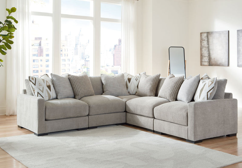 Benchcraft Aslan Court 5-piece sectional with matching ottoman, featuring plush cushions and modern fabric upholstery for living room comfort.