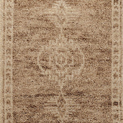 Classic Home Luxor Cairo hand-knotted rug with intricate geometric patterns in warm earthy tones.