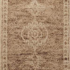 Classic Home Luxor Cairo hand-knotted rug with intricate geometric patterns in warm earthy tones.