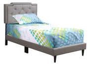 Button tufted upholstered bed by Glory Furniture featuring a cozy, elegant design with a padded headboard and plush fabric.
