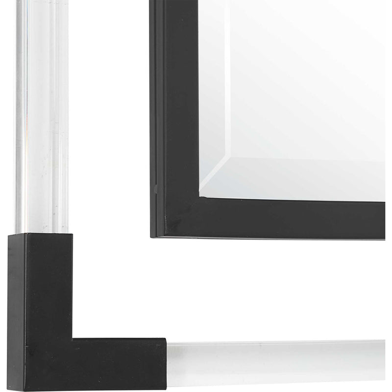 Uttermost Balkan Iron Wall Mirror with ornate metal frame, decorative design, and reflective glass surface.