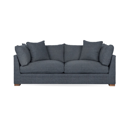 Classic Home Audrey stationary sofa with plush cushions and elegant design, showcasing a cozy living room setup.