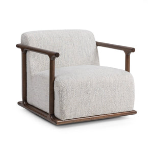 Classic Home Lucia swivel chair with a plush cushioned seat and curved armrests, shown in a cozy living room setting.