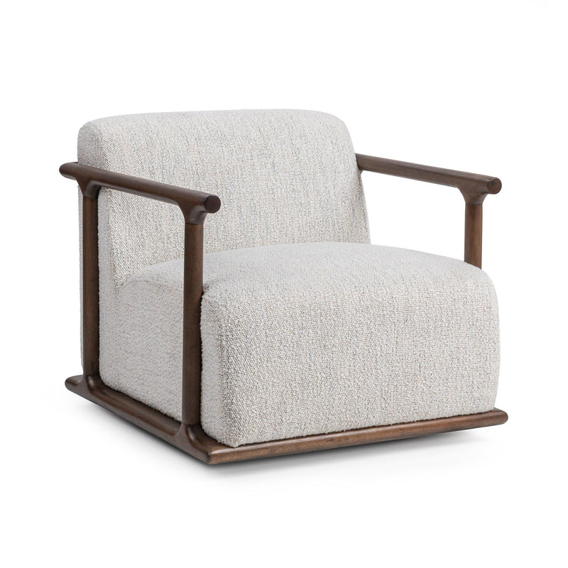 Classic Home Lucia swivel chair with a plush cushioned seat and curved armrests, shown in a cozy living room setting.