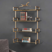 Gold wall shelf by Uttermost Auley, modern wall shelf with sleek gold finish and minimalist design, mounted on a wall.