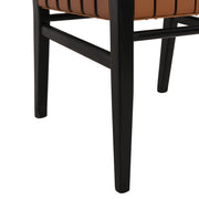Modern Noble House dining side chair with a sleek design, featuring a cushioned seat and wooden legs in a contemporary style.