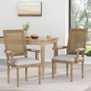 Elegant French country style arm dining chair with cane backrest and wooden frame, crafted by Noble House.