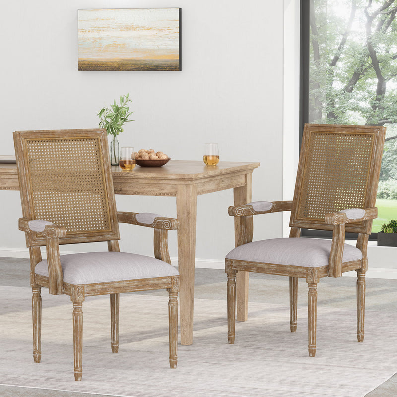 Elegant French country style arm dining chair with cane backrest and wooden frame, crafted by Noble House.