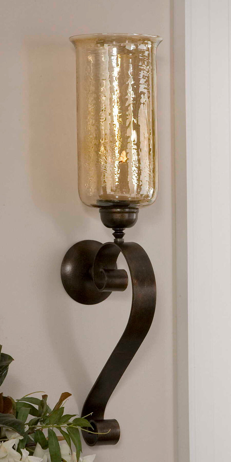 Joselyn bronze candle wall sconce by Uttermost, featuring a stylish design with a candle holder on a decorative wall mount.