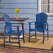 Set of two Noble House outdoor weather-resistant acacia wood Adirondack dining chairs on patio, designed for outdoor comfort and style.