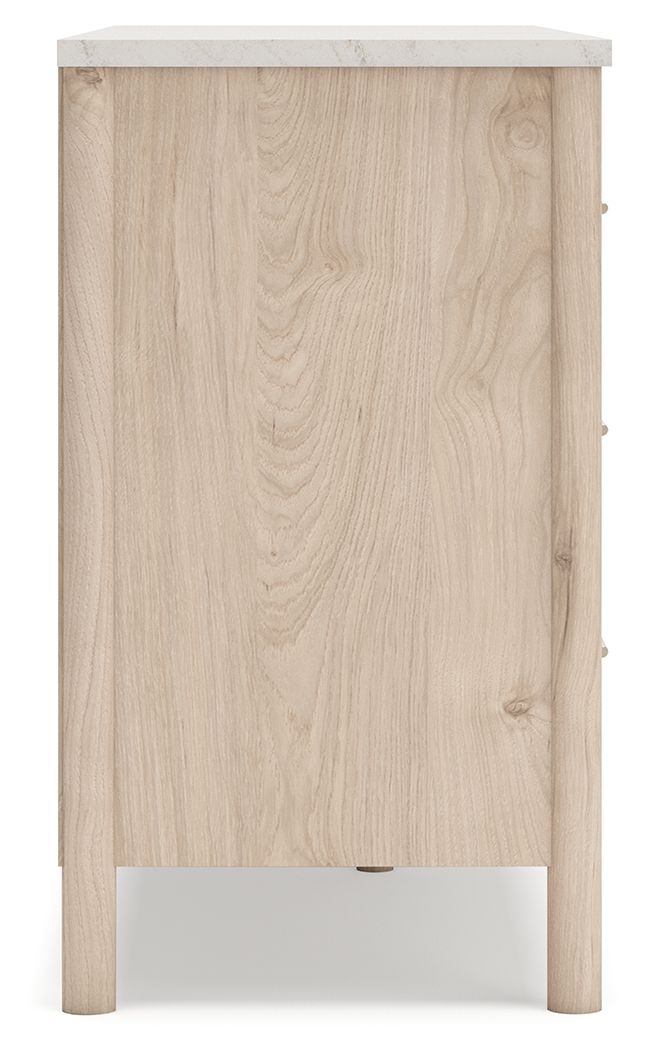 Signature Design by Ashley Cadmori six-drawer dresser with dark wood finish and modern handles, showcasing spacious storage.