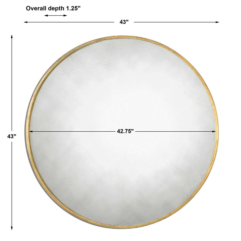 Uttermost Junius round wall mirror with a sleek frame, hanging on a wall, showcasing modern home decor style.