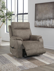Signature Design by Ashley Crestmeade Power Lift Recliner in plush fabric with padded armrests and a comfortable reclining feature.