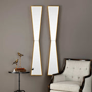 Gold wall mirror by Uttermost with a sleek, mirror-inspired design perfect for modern decor.