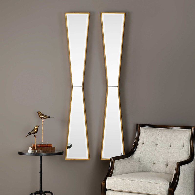 Gold wall mirror by Uttermost with a sleek, mirror-inspired design perfect for modern decor.
