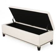 Beige upholstered storage ottoman with nailhead trim by Noble House, showcasing its plush fabric and sturdy construction.