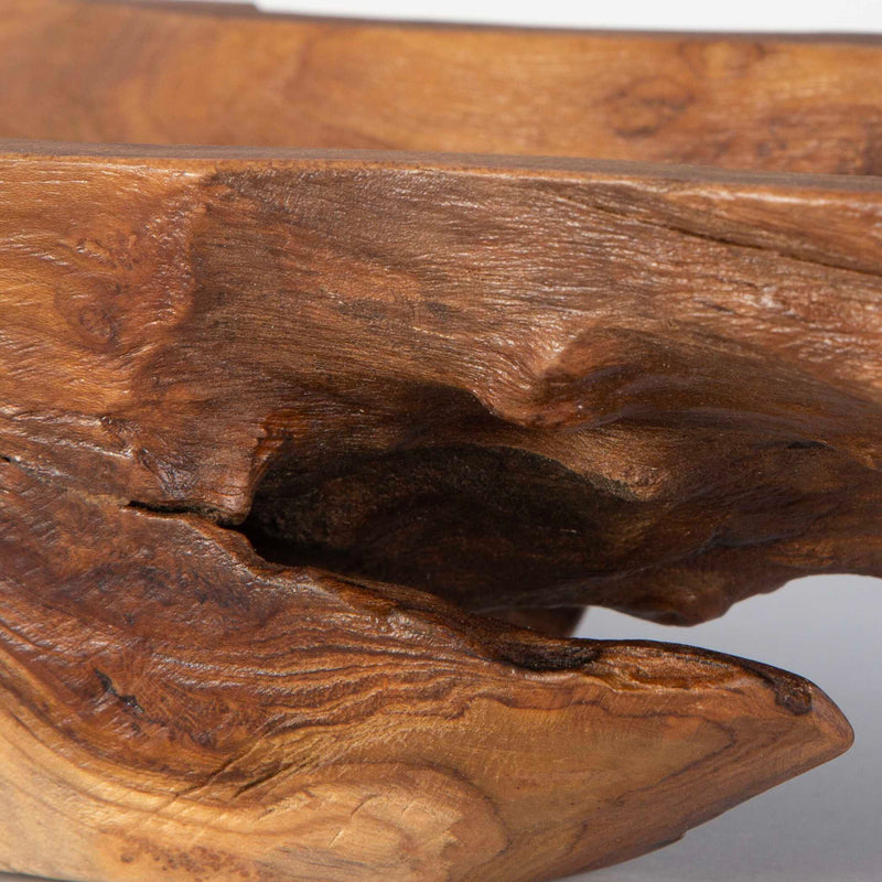Light brown teak leaf bowl by Uttermost, showcasing a natural, handcrafted design perfect for serving or decorative display.