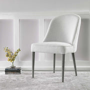 Set of two Uttermost Brie armless chairs with neutral upholstery and modern design, shown from a front angle.