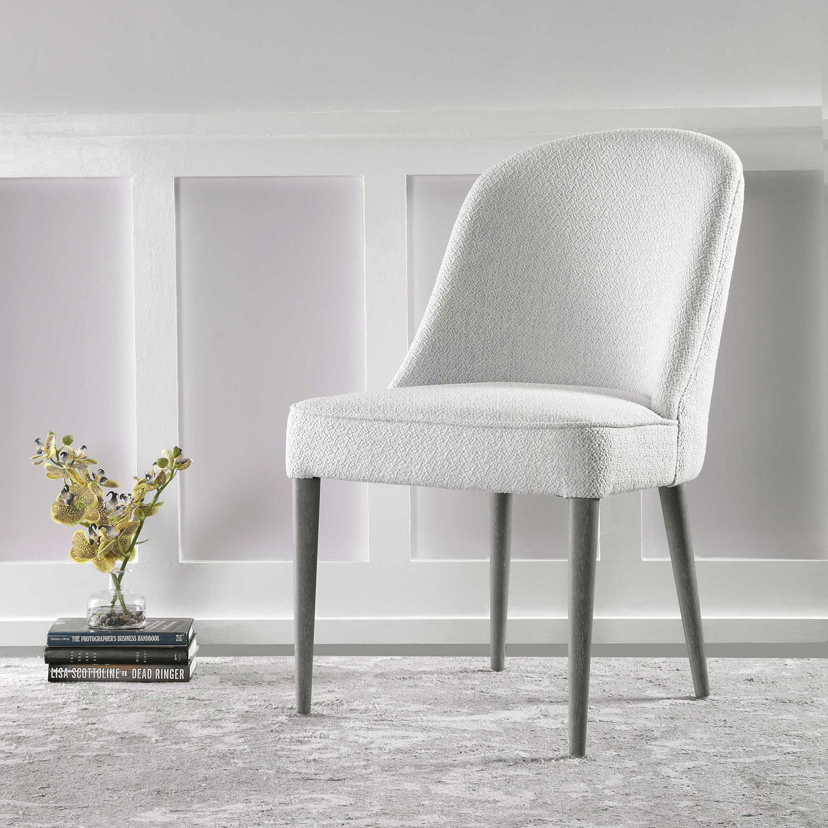 Set of two Uttermost Brie armless chairs with neutral upholstery and modern design, shown from a front angle.