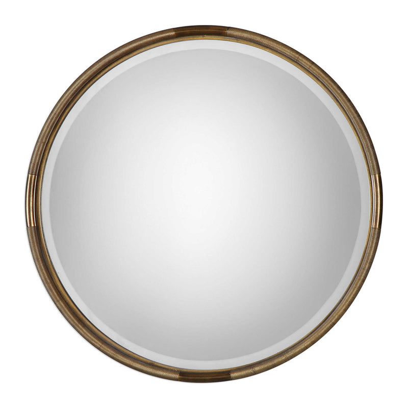 Uttermost Finnick iron coil round wall mirror with a gold finish, showcasing a stylish circular design and metallic frame.
