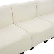 Noble House 3-seater sofa with curved armrests, stationary design, featuring plush cushions and modern style in a living room setting.