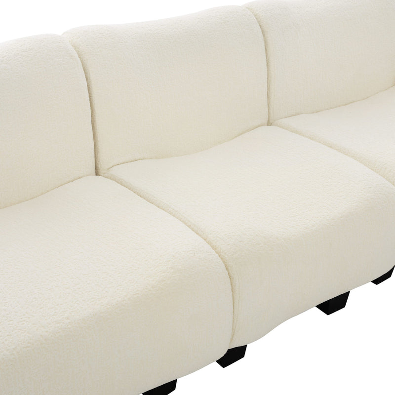 Noble House 3-seater sofa with curved armrests, stationary design, featuring plush cushions and modern style in a living room setting.