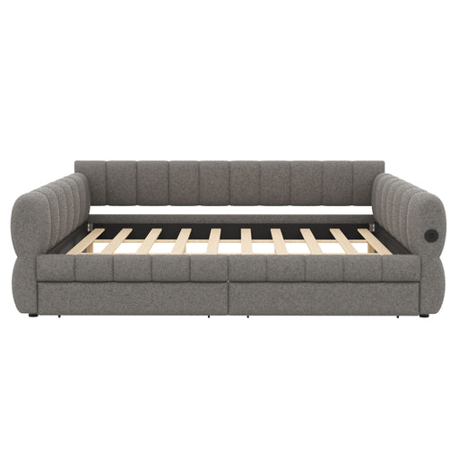 Dreamland upholstered platform bed with USB charging ports and two storage drawers, featuring a modern, padded headboard.