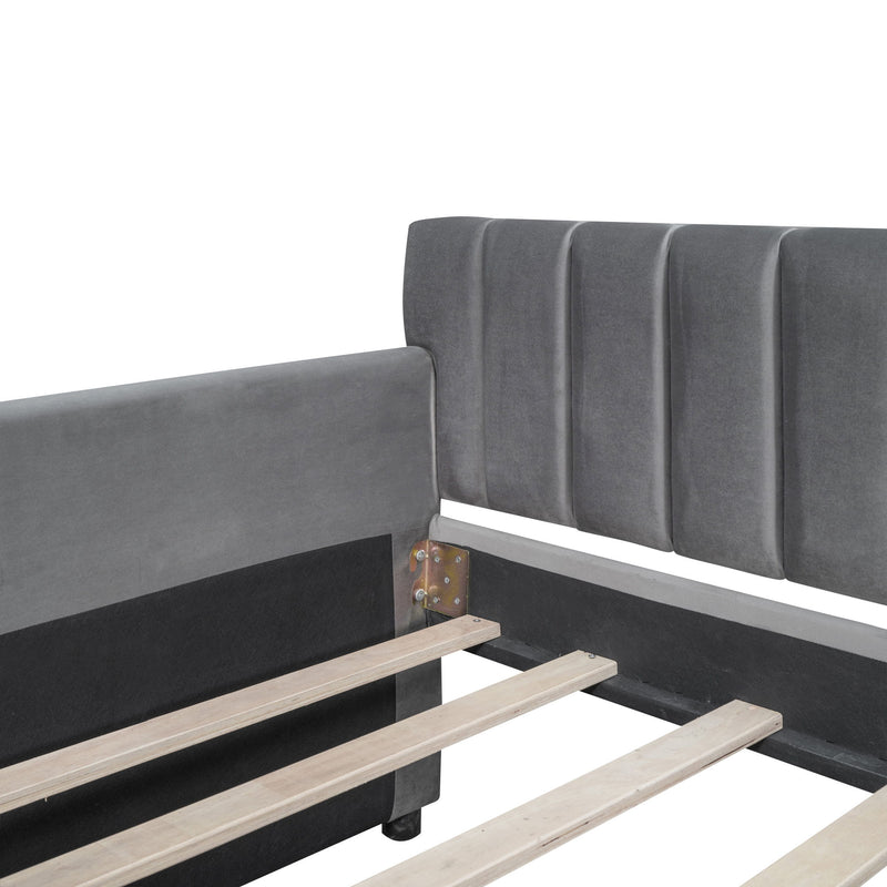DreamHaus upholstered storage daybed with slat support, showcasing soft fabric upholstery and built-in storage drawers underneath.
