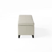 Noble House Glouster contemporary storage ottoman with fabric upholstery and wooden legs, serving as a stylish storage and seating piece.